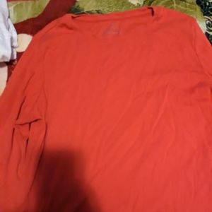 Orange long sleeve shirt